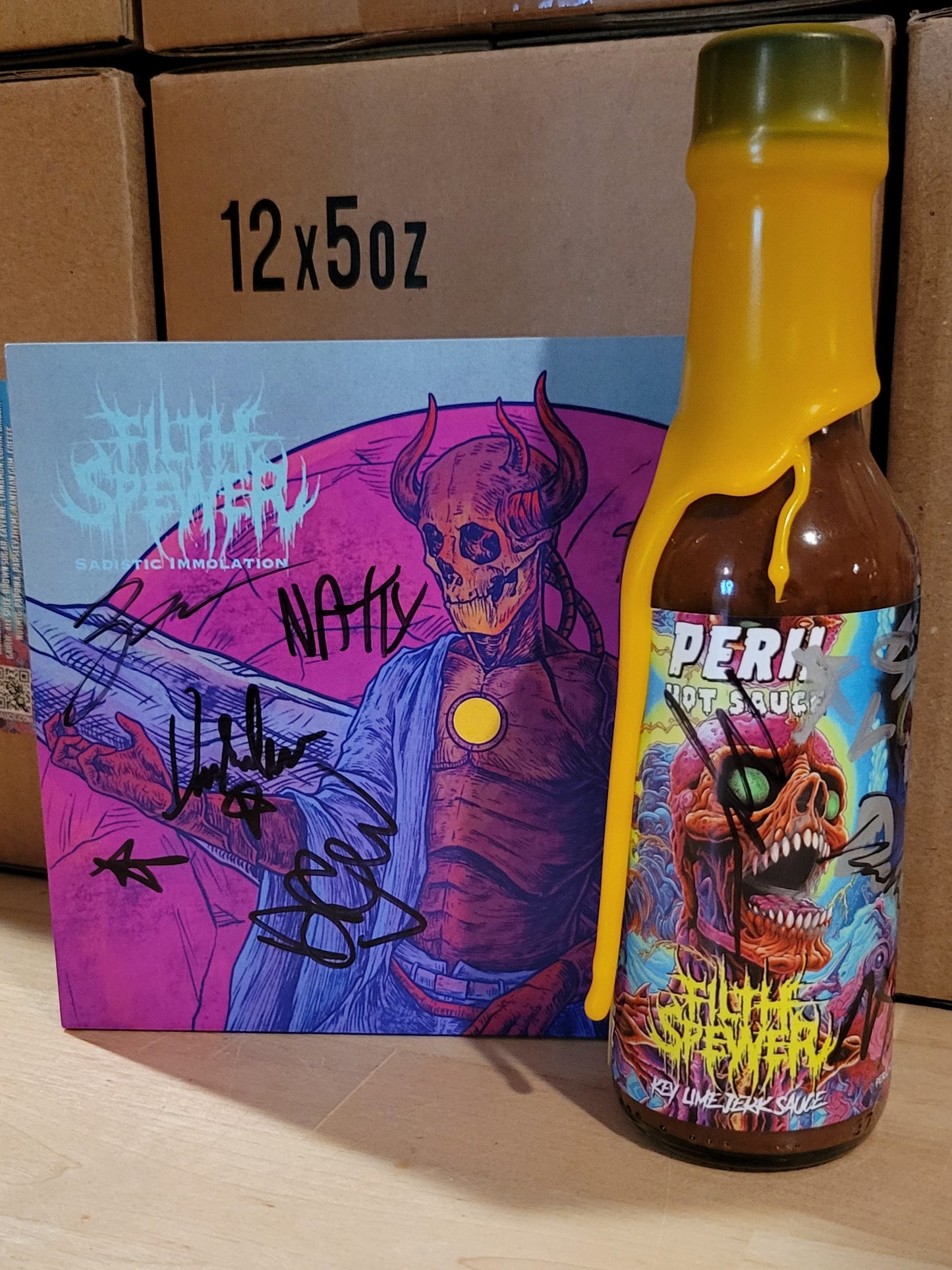 FILTH SPEWER Autographed CD & Special Edition wax dipped bottle set